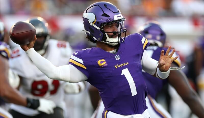 Minnesota Vikings quarterback Kyler Murray (1) passes the ball.