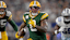Green Bay Packers running back Josh Jacobs (8) runs with the ball during the game between the Dallas Cowboys and the Green Bay Packers at AT&T Stadium.
