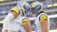 Los Angeles Rams quarterback Mathew Stafford (9) celebrates with Los Angeles Rams wide receiver Puka Nacua (17) 