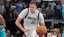 Dallas Mavericks forward Cooper Flagg (32) dribbles up court against the Charlotte Hornets in the second half of a game at American Airlines Center.