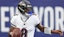 Baltimore Ravens quarterback Lamar Jackson (8) drops back to pass.
