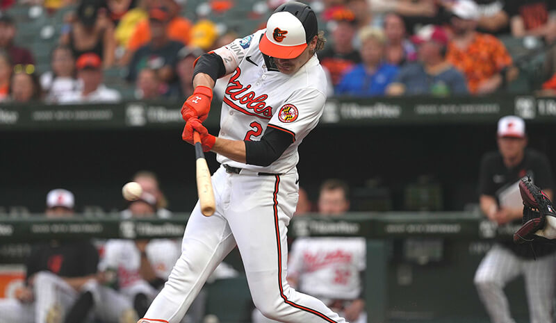 Baltimore Orioles shortstop Gunnar Henderson (2) connects for a single in the third inning against the Chicago Cubs at Oriole Park at Camden Yards.