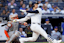 New York Yankees right fielder Juan Soto (22) follows through on a solo home run against the New York Mets during the third inning at Yankee Stadium. Mandatory Credit: Brad Penner-Imagn Images