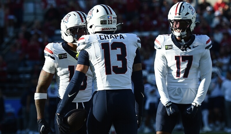Arizona Wildcats defense celebrates after a play.