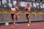Melissa Jefferson-Wooden (USA), left, defeats Gabby Thomas (USA) to win the women's 200m, 21.99 to 22.10, during the Grand Slam Track Philadelphia at Franklin Field on May 31. Kirby Lee-Imagn Images