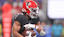 Atlanta Falcons running back Bijan Robinson (7) carries the ball against the Buffalo Bills during the first half of a game at Mercedes-Benz Stadium.