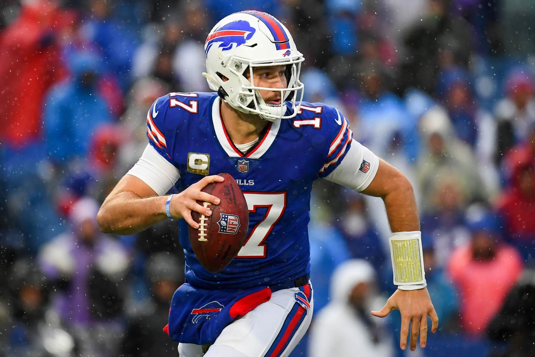 Buffalo Bills quarterback Josh Allen (17) runs with the ball against the Indianapolis Colts during the second half at Highmark Stadium.