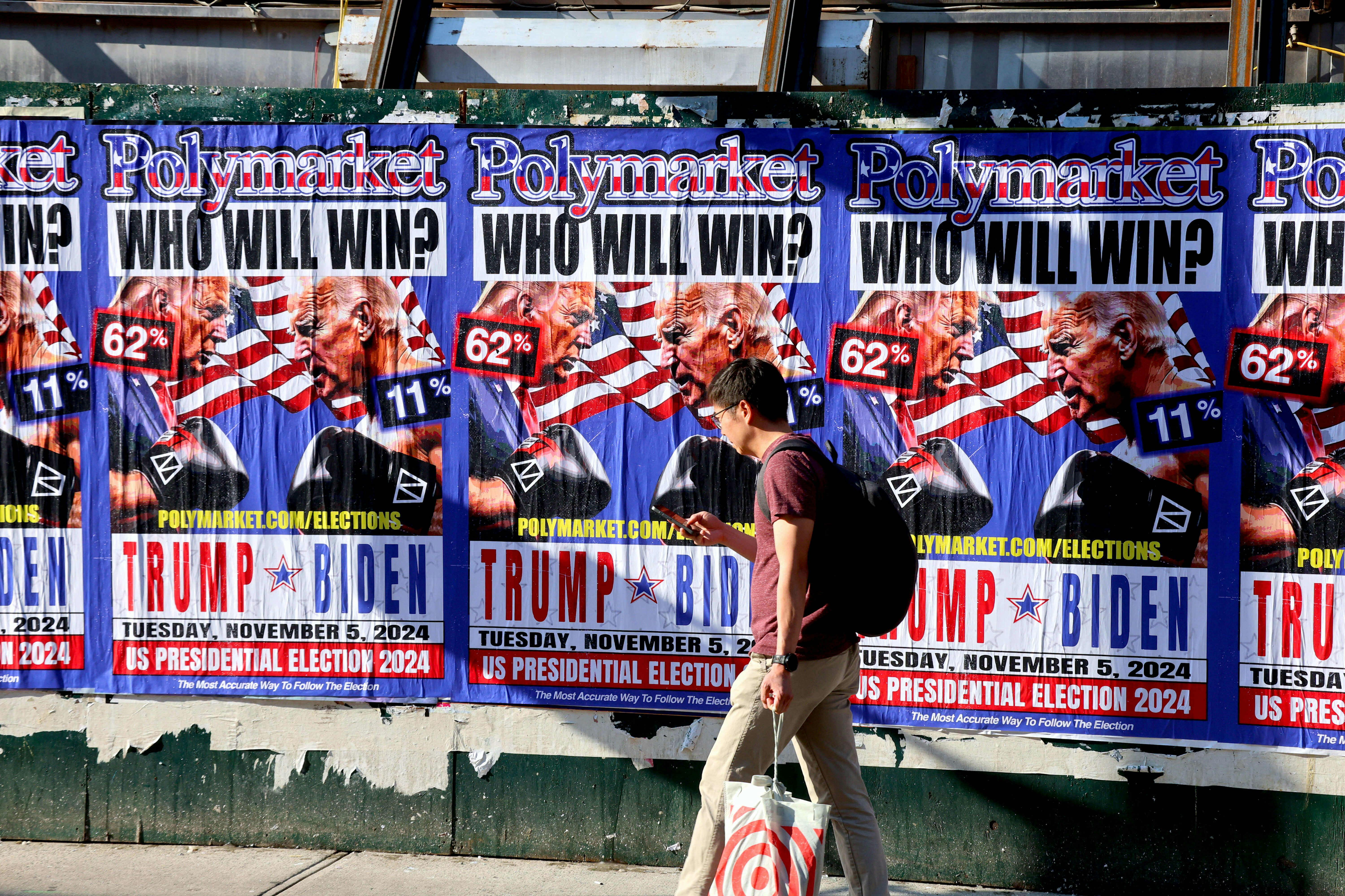 Joe Biden VS Donald Trump billboard on the street by Polymarket, world's largest prediction market in The Little Italy in New York on July 15, 2024. Photo by Charles Guerin/Abaca/Sipa USA