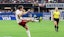 Canada defender Vanessa Gilles (14) kicks the ball down the field.