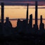 A general view as the sun sets behind the New York City skyline as seen from Arthur Ashe Stadium. Jerry Lai-USA TODAY Sports