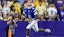Florida Gators quarterback DJ Lagway (2) scrambles out the pocket to pass.