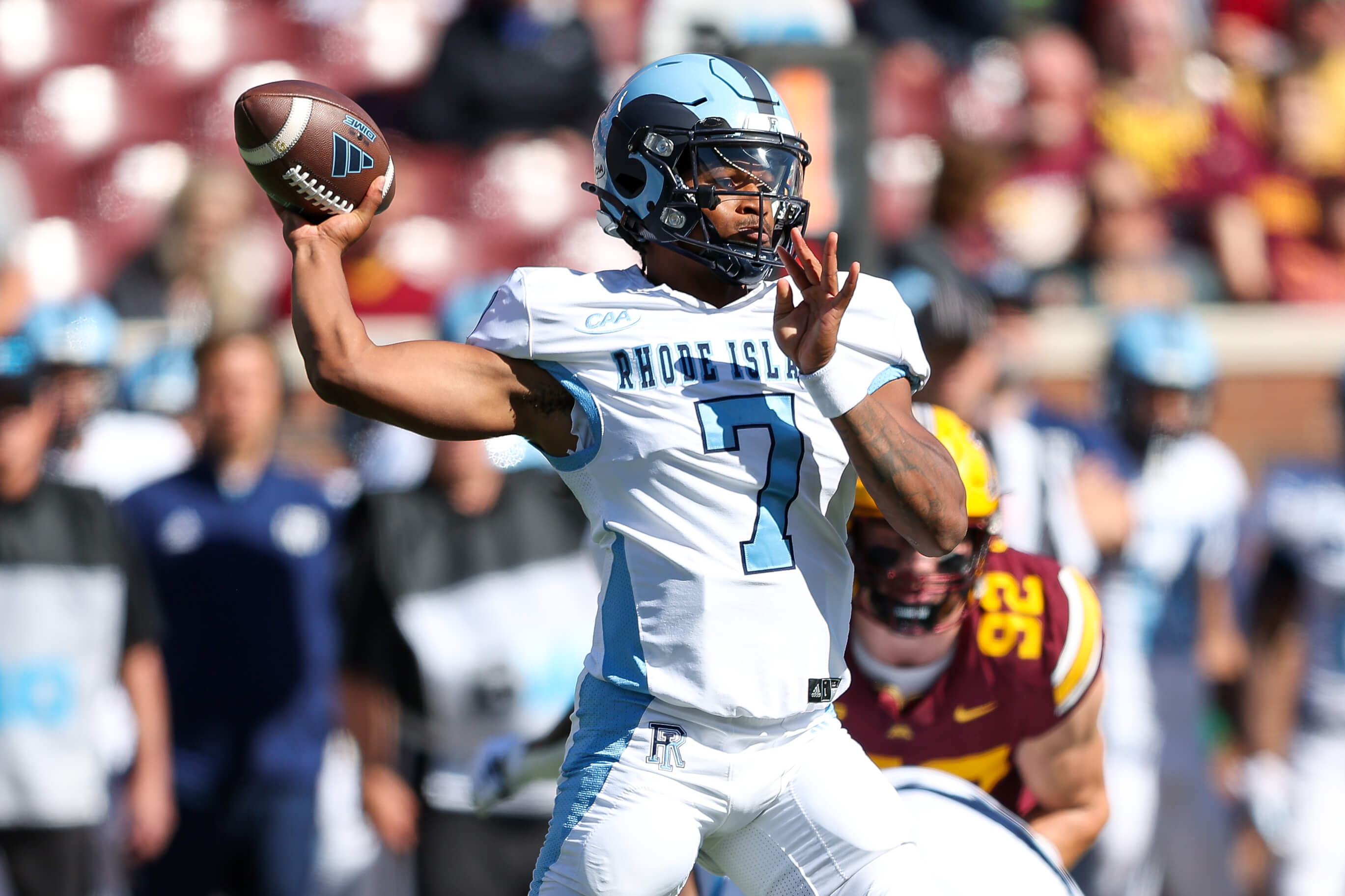 Rhode Island Rams quarterback Devin Farrell (7) throws against the Minnesota Golden Gophers during the first half at Huntington Bank Stadium. Mandatory Credit: Matt Krohn-Imagn Images