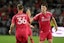 St. Louis City forward Cedric Teuchert (36) is congratulated by St. Louis City midfielder Chris Durkin (8) after scoring a goal against Aston Villa in the second half at Energizer Park. Joe Puetz-Imagn Images