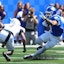 Kentucky’s running back Seth McGowan (3) runs against Toledo’s Avery Smith.