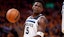 Minnesota Timberwolves guard Anthony Edwards (5) holds onto the ball.