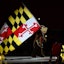 Maryland Terrapins mascot waves a flag before the game between the Maryland Terrapins and the Florida A&M Rattlers at Xfinity Center. Reggie Hildred-Imagn Images