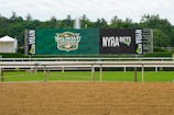 A general view of the Belmont Stakes at Saratoga and NYRA Bets sign Monday morning at Saratoga Race Course. Mandatory Credit: Gregory Fisher-USA TODAY Sports