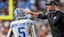 Detroit Lions head coach Dan Campbell celebrates a two point conversion against Washington Commanders scored by running back David Montgomery.