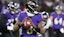 Baltimore, MD, USA; Baltimore Ravens quarterback Lamar Jackson (8) rolls out to throw against the Houston Texans during the second quarter of a 2024 AFC divisional round game at M&T Bank Stadium.