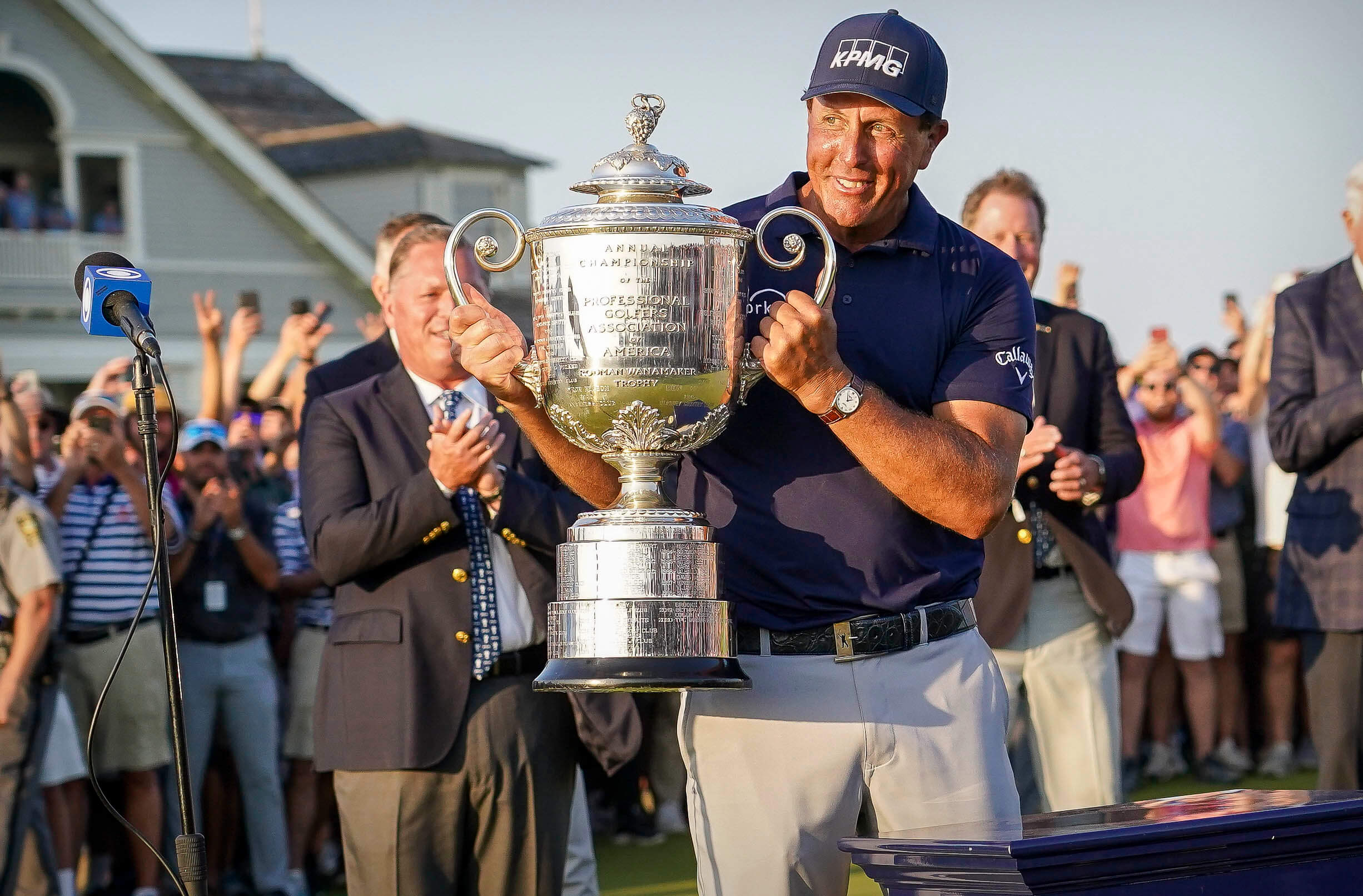 Phil Mickelson raises the Wanamaker Trophy after winning the PGA Championship golf tournament.