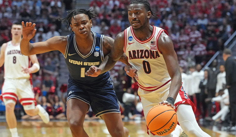 Jaden Bradley (0) controls the ball against the Utah State Aggies.