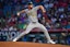 Athletics pitcher Michael Kelly (49) throws against the Los Angeles Angels during the sixth inning at Angel Stadium.
