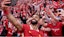 Liverpool player Mohamed Salah celebrates by taking a selfie after winning the Premier League.