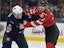 Team United States forward Matthew Tkachuk (19) and Team Canada forward brandon Hagel (38) fight in the first period during a 4 Nations Face-Off ice hockey game at the Bell Centre. Mandatory Credit: Eric Bolte-Imagn Images