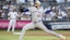 New York Mets starting pitcher David Peterson (23) pitches in the first inning.