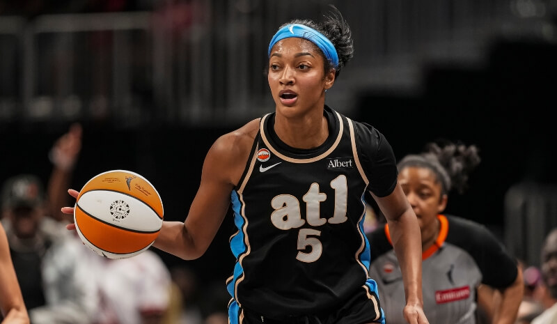 Atlanta Dream forward Angel Reese (5) controls the ball.