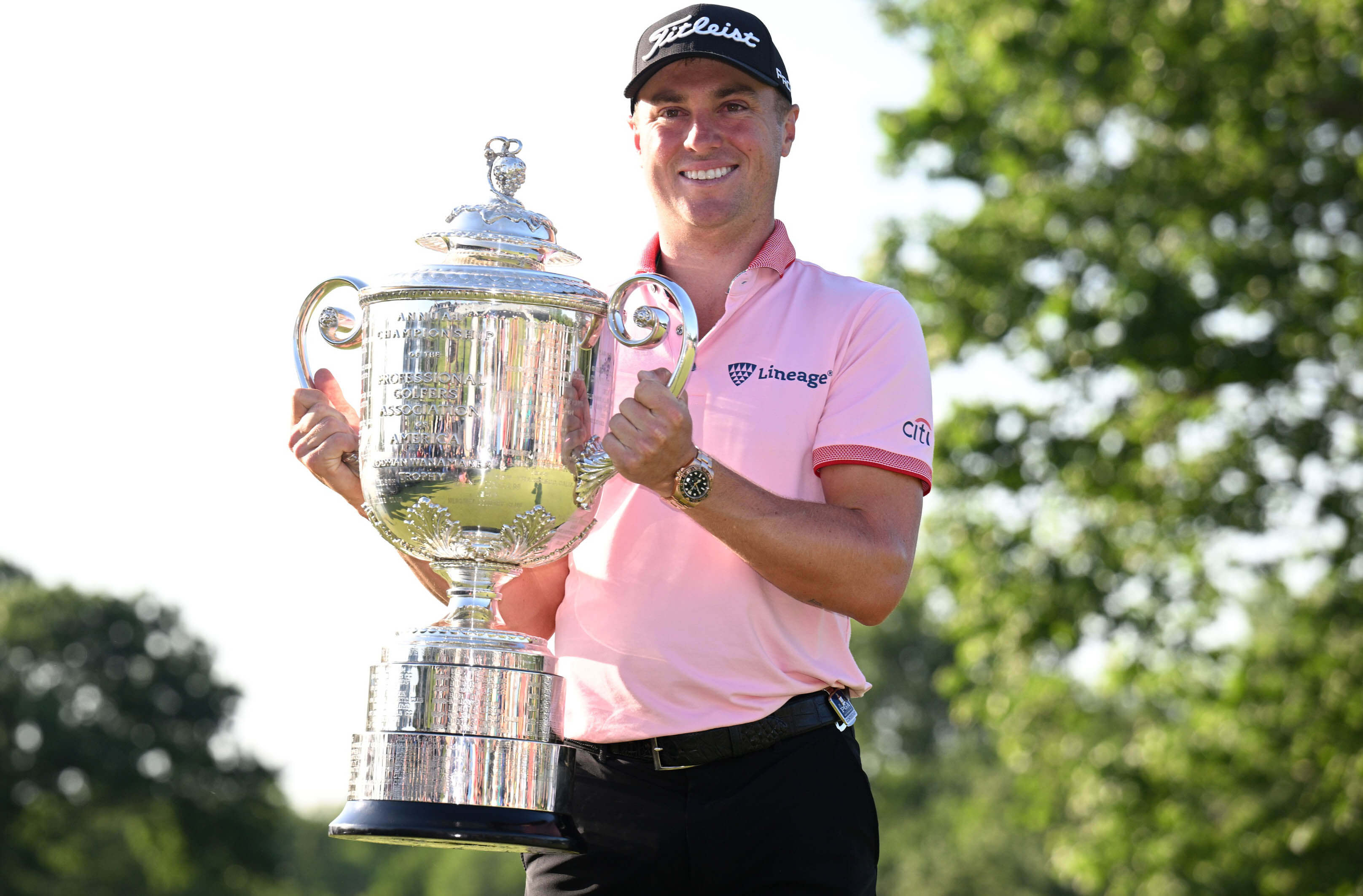 Justin Thomas poses with the Wanamaker trophy after winning the PGA Championship golf tournament at Southern Hills Country Club.