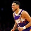 Phoenix Suns guard Devin Booker (1) reacts after a play during the first quarter.