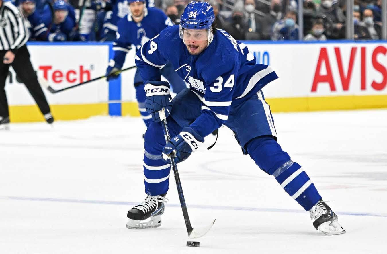 Toronto Maple Leafs forward Auston Matthews (34) carries the puck up ice against the Arizona Coyotes in the first period at Scotiabank Arena.