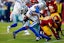 Dallas Cowboys wide receiver KaVontae Turpin (9) breaks a tackle by Washington Commanders safety Jeremy Reaves (39) to run for a touchdown on a kickoff return during the fourth quarter at Northwest Stadium. Mandatory Credit: Peter Casey-Imagn Images