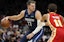 Dallas Mavericks guard Luka Doncic (77) controls the ball against Atlanta Hawks guard Trae Young (11) during the first quarter at State Farm Arena.