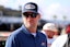 NASCAR team owner Dale Earnhardt Jr. looks on during practice for the Daytona 500 at Daytona International Speedway.