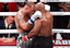 Mike Tyson (black gloves) hugs Jake Paul (silver gloves) after their fight at AT&T Stadium. Mandatory Credit: Kevin Jairaj-Imagn Images