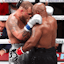 Mike Tyson (black gloves) hugs Jake Paul (silver gloves) after their fight at AT&T Stadium. Mandatory Credit: Kevin Jairaj-Imagn Images