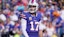 Buffalo Bills quarterback Josh Allen turns and looks towards the coaches.