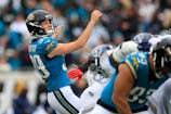 Jacksonville Jaguars place kicker Cam Little (39) follows his point after try during the second quarter of an NFL football matchup at EverBank Stadium, Sunday, Jan. 4, 2026, in Jacksonville, Fla. [Corey Perrine/Florida Times-Union]
