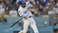 Dodgers outfielder Andy Pages (44) singles during the third inning.