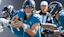 Jacksonville Jaguars quarterback Trevor Lawrence (16) runs the ball during the third quarter of an NFL football matchup.