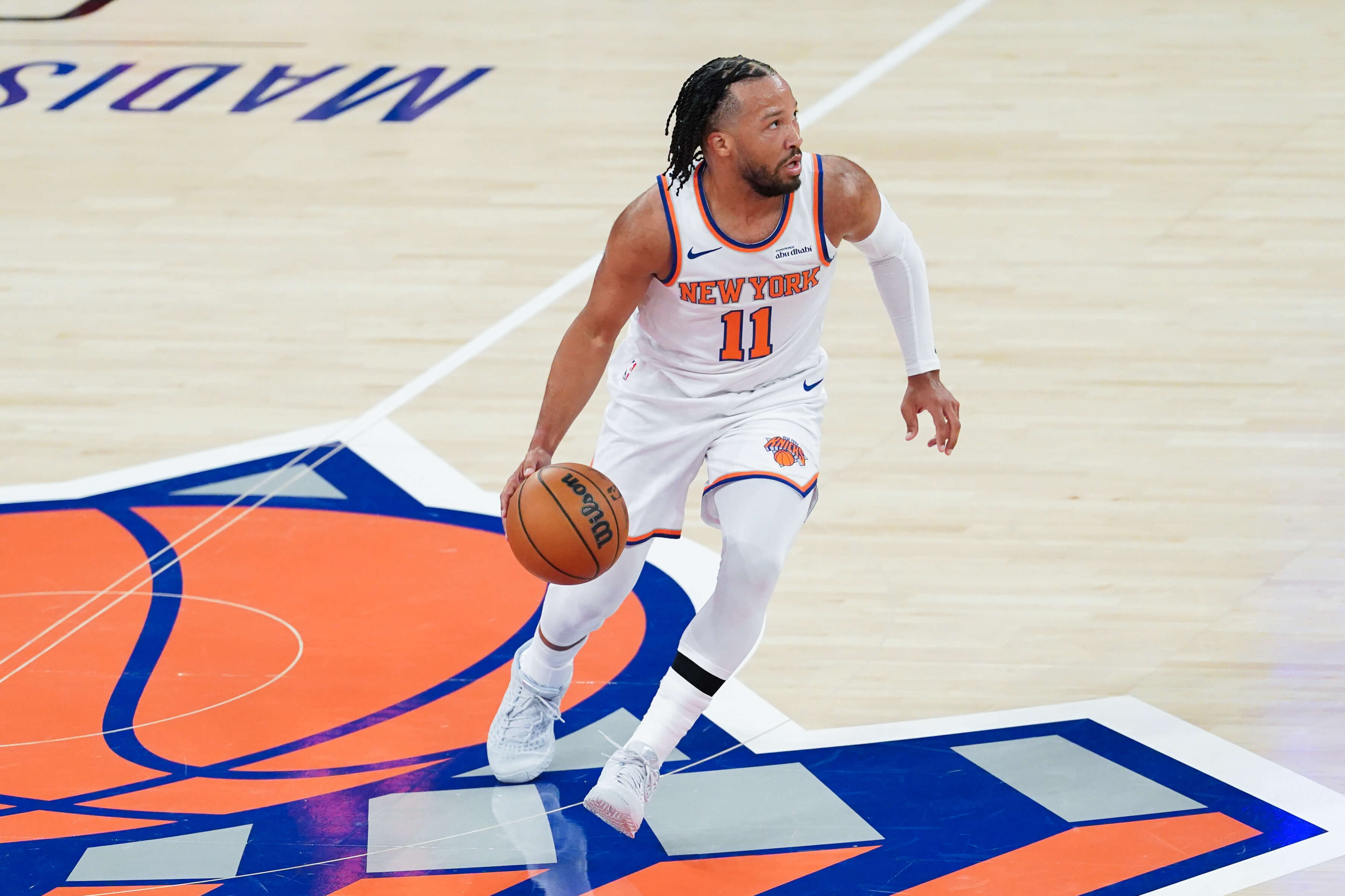 New York Knicks guard Jalen Brunson (11) brings the ball up court against the Washington Wizards during the first quarter at Madison Square Garden.