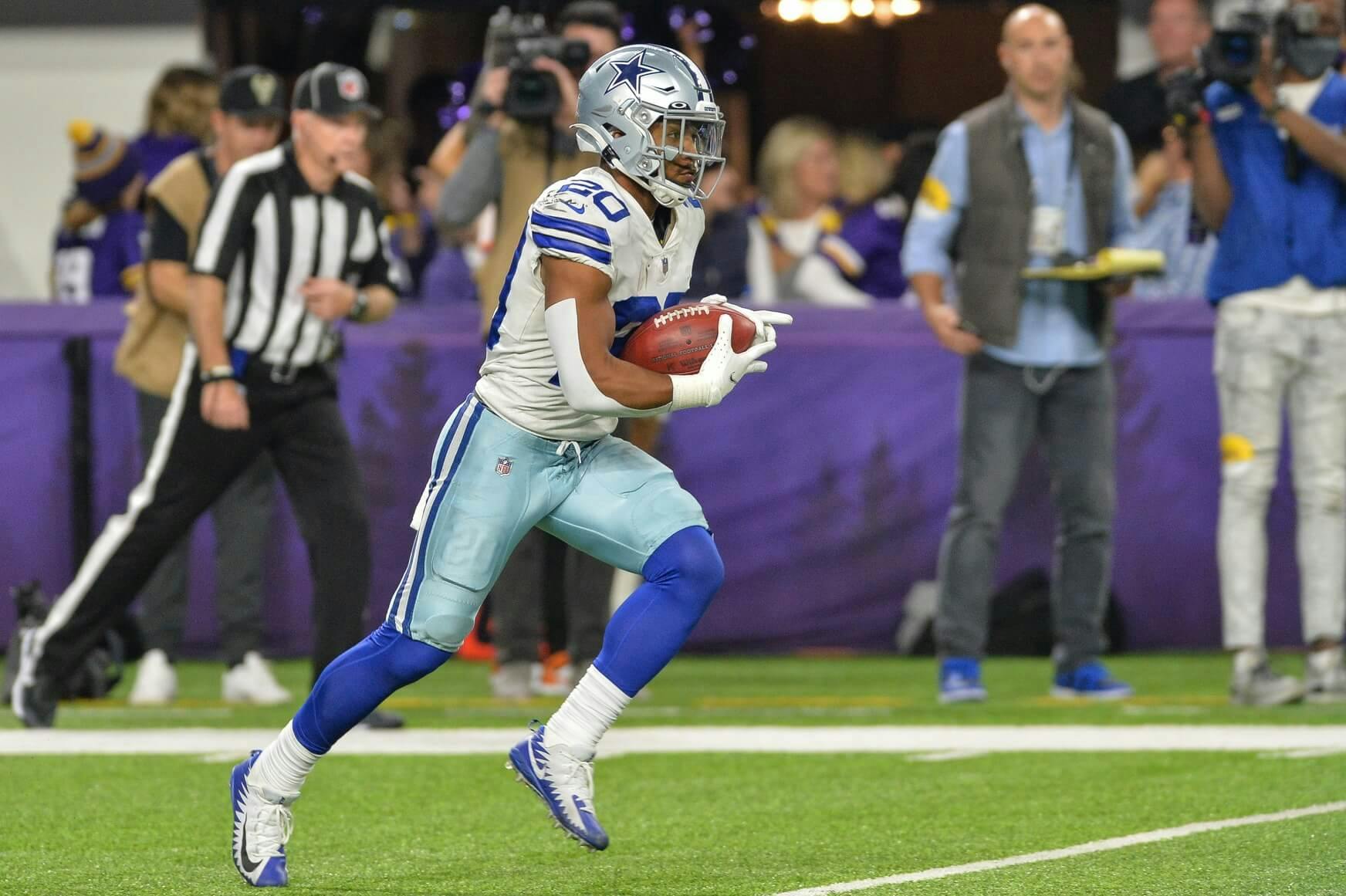 Dallas Cowboys running back Tony Pollard (20) in action during the game against the Minnesota Vikings at U.S. Bank Stadium.