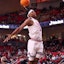 Texas Tech's JT Toppin rises for a dunk in a non-conference Division I basketball game.