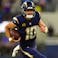 Los Angeles Chargers quarterback Justin Herbert (10) rushes the ball against the Minnesota Vikings.