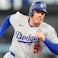 Los Angeles Dodgers first baseman Freddie Freeman (5) runs home to score against the Toronto Blue Jays in the first inning during game two of the 2025 MLB World Series at Rogers Centre.