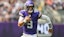 Minnesota Vikings quarterback J.J. McCarthy (9) scrambles for a gain.