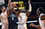 SC Upstate Spartans guard Mysta Goodloe (3) attempts a shot between Tennessee Volunteers forward Olivier Nkamhoua (13) and guard Jahmai Mashack (15) during the first half at Thompson-Boling Arena.