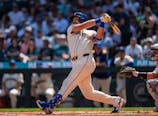 Seattle Mariners catcher Cal Raleigh (29) hits a two-run home run during the first inning against the Athletics at T-Mobile Park. Stephen Brashear-Imagn Images